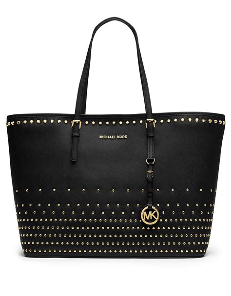 michael kors bag leather black|Michael Kors black studded handbag.